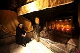 Nun Prays in the Birthplace of Jesus