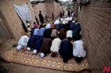 Pakistanis Pray In Festival To Celebrate End Of Ramadan