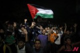 Palestinians Celebrate Cease-Fire Agreement Ending Military Conflict In Gaza Strip