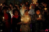 Indonesian Women Hold Candles In Vigil For Victims Of Sexual Crimes Against Childen