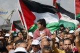 Israeli protestors hold Palestinian flags for return of Palestinian refugees
