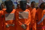 Yemenis in prison uniforms demand release of Guantanamo prisoners