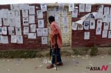 Posters look for missing persons in Bangladeshi building collapse