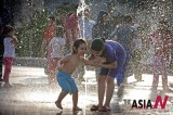 Heatwave Attracts Iranian Kids To Fountain
