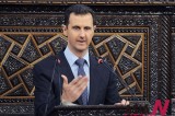 Assad Defies U.N. Resolution To Resign
