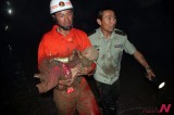 A Child Being Rescued At Collapsed Road In Harbin