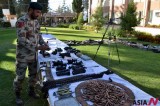Pakistani Security Officer Shows Weapons Seized From Terrorists Arrested In Quetta