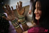 Indian Hindu Woman Has Her Hands Painted With Henna For Celebration Of “Karwa Chauth”