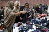 Pakistanis Do Shopping At Second Hand Clothes Market In Lahore For Winter