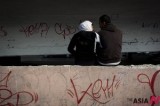 An Egyptian Couple Talk Under A Bridge Amid Report Of Investigation Into Accusations Against Opposition Leaders