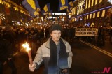 A Ukrainian Carries A Torch During A Rally To  Remember Stepan Bandera Who Stood Up Against Soviet Regime