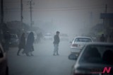 Afghan Women Walk Along A Road In Kabul