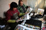 Chinese Craftsman Busy Painting New Year Pictures For Spring Festival