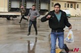 People run away at a car bomb explosion at Turkey-Syria border region