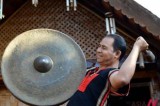 An ethnic minority artisan in Vietnam performs a gong, a UNESCO Cultural Heritage