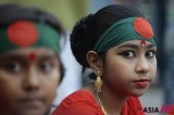 Bangladeshi children wearing national flag on their forehead celebrate Independence Day in Dhaka