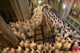 Catholic clergy take part at Washing of Feet ceremony at church in Jerusalem