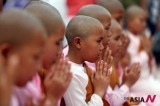 Novices pray at Shwedagon Pagoda on Myanmarese New Year’s day