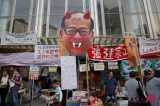Hong Kong port workers on strike at billionaire Li Ka-shing’s headquarters