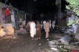 Pakistanis gather at bomb blast site that killed 4 people