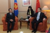 Chinese FM Yi meets with ASEAN Secretary-General Le Luong Minh