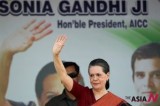 India’s ruling Congress chief Sonia Gandhi waves to supporters