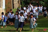 Filipino elementary pupils attend school at first day of new school year