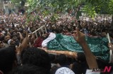 Kashmiri villagers shout slogans carrying rebel commander’s dead body