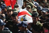Relatives of Palestinian youth killed by Israeli army jeep mourn during funeral