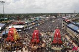 Hindu devotees around chariot of Hindu god during annual Rath Yatra in India