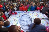 South Africans celebrate Mandela’s 95th birthday outside hospital