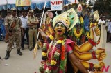 Indian artists perform in Hindu goddess Kali costume during Bonalu folk festival