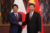 President Abe and Xi pledge Japan and China will deepen cooperation