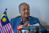 Mahathir advises urban poor to engage in business
