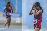 Cambodian athlete braves pounding rain to win hearts, admiration