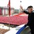 In this Sunday, April 15, 2012 photo released by the Korean Central News Agency and distributed by the Korea News Service on April 16, 2012, North Korean leader Kim Jong Un acknowledges cheers during a mass military parade in Pyongyang's Kim Il Sung Square to celebrate the centenary of the birth of his grandfather, national founder Kim Il Sung in Pyongyang, North Korea.