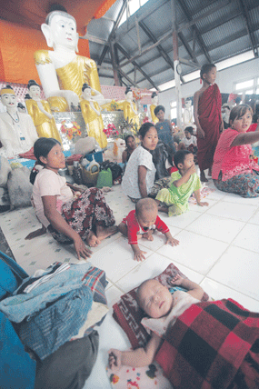 People displaced by communal violence in Rakhine State take refuge in Sittwe’s Maha Zaya Thateddi Adate Htan Monastery on June 14.  Pic: Boothee