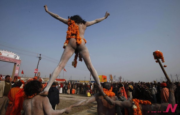 Indian Folk Artists Accompany Naked Hindu Holy Men Procession In Religious Congregation