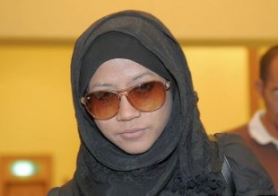 Muhdalena, in the court for trials. (Photo: The Star Online)