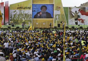 Hezbollah leader vows to support ally Syria while it is under attack