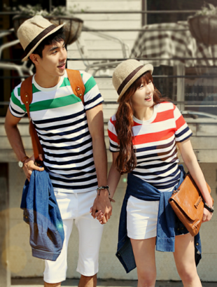 A couple wearing a couple outfit. (Source: www.couplemotion.com)