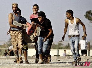 Libyan proptesters attack on pro-government militias, 28 dead