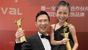Hong Kong actor Nick Cheung and Malaysian child actress Crystal Lee won the awards for best actor and best actress for movie “Unbeatable” at the 16th Shanghai Film Festival on 23 June