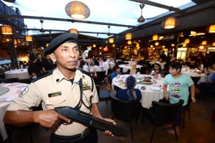 Security Guard patrolling restaurant