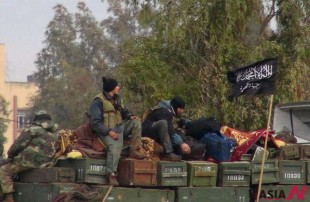 In this Friday, Jan. 11, 2013 file citizen journalism image provided by Edlib News Network, ENN, which has been authenticated based on its contents and other AP reporting, rebels from al-Qaida affiliated Jabhat al-Nusra sit on a truck full of ammunition at Taftanaz air base, that was captured by the rebels, in Idlib province, northern Syria. President Barack Obama said early on in the 2 1/2-year-old conflict that Assad lost the right to lead because of the brutal oppression of his people, most chillingly displayed in what Washington contends was an Aug. 21 chemical weapons attack on rebel-held areas that killed hundreds of civilians. But it?s not clear who would replace Assad if he were to be driven from power, either as a result of U.S. punitive strikes for the suspected poison gas attacks or in eventual political transition talks with the Western-backed opposition. Arabic on the flag, right, reads, "There is no God only God and Mohamad his prophet, Jabhat al-Nusra."