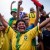 Brazilian football fans celebrate a goal while watching the opening match between Brazil and Croatia of the 2014 FIFA World Cup at the Farol da Barra in Salvador, Bahia, Brazil, on June 12, 2014.
