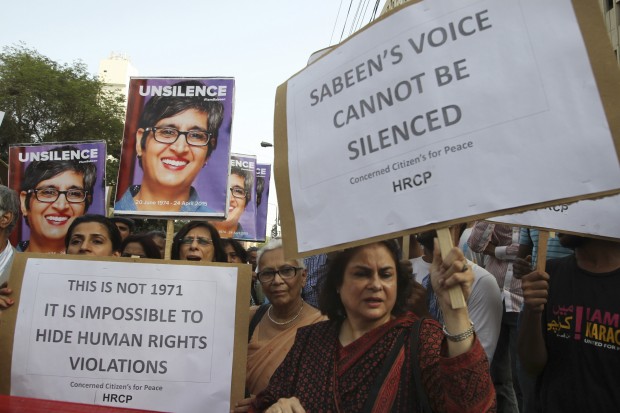 Members of a Pakistani civil society rally for prominent women's rights activist Sabeen Mahmud, who was killed by unknown gunmen, Thursday, April 30, 2015 in Karachi, Pakistan. Gunmen on a motorcycle killed Mahmud last Friday in Pakistan just hours after she held a forum on the country's restive Baluchistan region, home to a long-running insurgency, police said. (AP Photo)