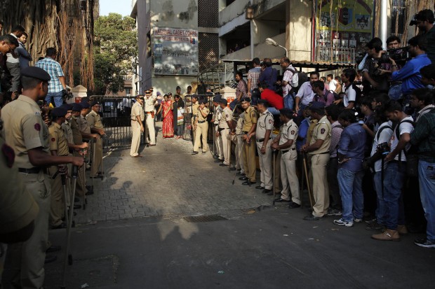 Indian policemen guard outside the Mumbai Sessions court during Bollywood actor Salman Khan's verdict in Mumbai, India, Wednesday, May 6, 2015. One of India's biggest and most popular movie stars, Khan, was sentenced to five years in jail Wednesday on charges of driving a vehicle over five men sleeping on a sidewalk and killing one in a hit-and-run case that has dragged for more than 12 years. (AP Photo)