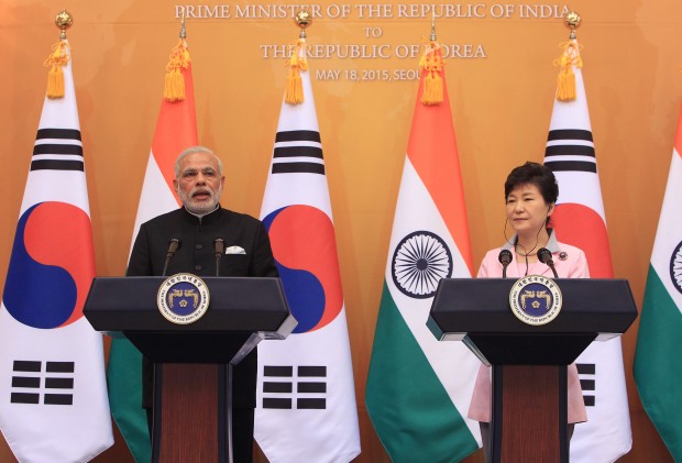 Indian Prime Minister Narendra Modi, left, and South Korean President Park Geun-hye hold a joint news conference at the presidential Blue House on May 18, 2015 in Seoul, South Korea. (Photo via AP)
