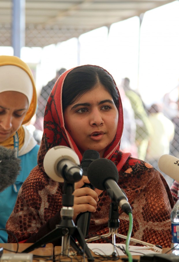 In this photo taken in Feb. 2014, Malala Yousafazi speaks during a press conference at Zattari Syrian refugee camp near the city of Mafraq, Jordan. Education campaigner of Pakistan Malala visited the Syrian refugee camp on the Syria-Jordan border on Tuesday, meeting hundreds of Syrian war refugees. (Xinhua/Mohammad Abu Ghosh)